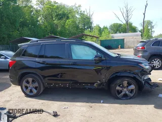2021 Honda Passport Touring z VIN 5FNYF8H96MB014947, wystawiony jako IAAI lot #42150399 z przebiegiem 47 499 mil mil oraz . Historia ofert i sprzedaży dostępna na DreamBid. Obrazek 13.