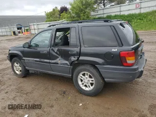 2003 Jeep Grand Cherokee Laredo z VIN 1J4GW48S53C568929, wystawiony jako Copart lot #57604245 z przebiegiem 216 103 mil mil oraz Czysty tytuł • Clean title. Historia ofert i sprzedaży dostępna na DreamBid. Obrazek 2.