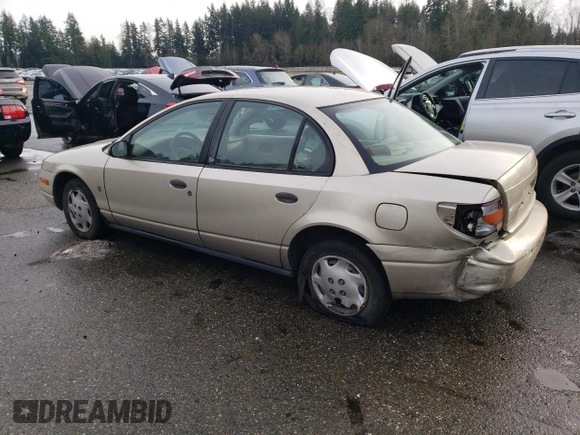 2001 Saturn SL z VIN 1G8ZH52851Z286886, wystawiony jako Copart lot #84883824 z przebiegiem Nie podano mil oraz Szkoda całkowita • Salvage title. Historia ofert i sprzedaży dostępna na DreamBid. Obrazek 2.