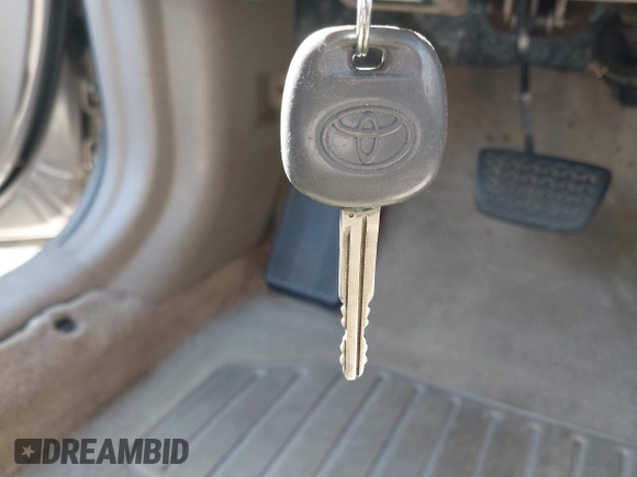 2005 Toyota Camry LE with VIN 4T1BF32K05U093461, listed as a IAAI auction lot 41947197 with 127,630 mi miles and . Bid and sale history available at DreamBid. Image 11.