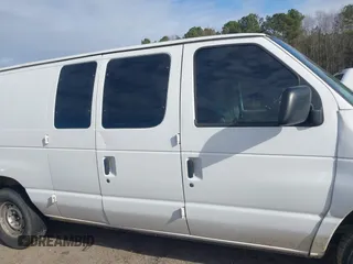 2002 Ford Econoline Cargo with VIN 1FTRE14252HB67887, listed as a IAAI auction lot 41180872 with 274,561 mi miles and . Bid and sale history available at carsss.com. Image 13.