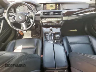 2015 BMW 5 Series 528i with VIN WBA5A5C59FD520199, listed as a Copart auction lot 59214725 with 116,914 mi miles and Salvage title. Bid and sale history available at DreamBid. Image 8.