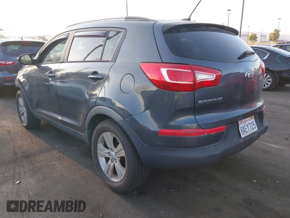 2013 Kia Sportage LX with VIN KNDPB3A24D7478526, listed as a IAAI auction lot 41943076 with 106,109 mi miles and . Bid and sale history available at carsss.com. Image 3.