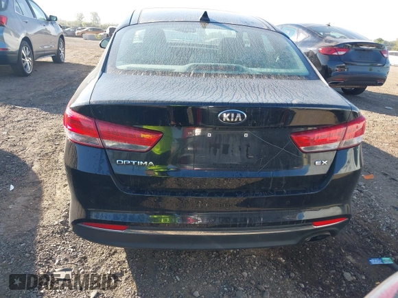 2016 Kia Optima EX with VIN 5XXGU4L39GG054891, listed as a IAAI auction lot 40325310 with 112,457 mi miles and . Bid and sale history available at DreamBid. Image 16.