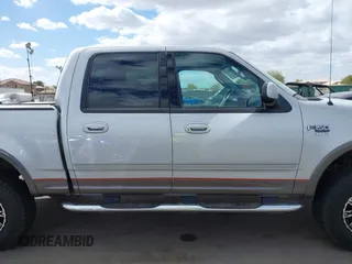 2003 Ford F-150 XLT with VIN 1FTRW08LX3KC79700, listed as a IAAI auction lot 41680562 with 131,052 mi miles. Bid and sale history available at carsss.com. Image 14.
