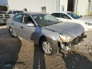 2002 Nissan Altima SL with VIN 1N4AL11D72C219113, listed as a Copart auction lot 82218234 with 0 mi miles and Salvage Title. Bid and sale history available at carsss.com. Image 4.