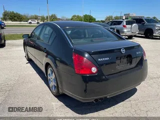 2004 Nissan Maxima SL with VIN 1N4BA41E94C883548, listed as a IAAI auction lot 42006917 with 158,277 mi miles. Bid and sale history available at carsss.com. Image 3.
