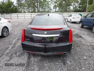 2014 Cadillac XTS Luxury z VIN 2G61N5S38E9292684, wystawiony jako IAAI lot #41842596 z przebiegiem 130 318 mil mil oraz . Historia ofert i sprzedaży dostępna na DreamBid. Obrazek 16.