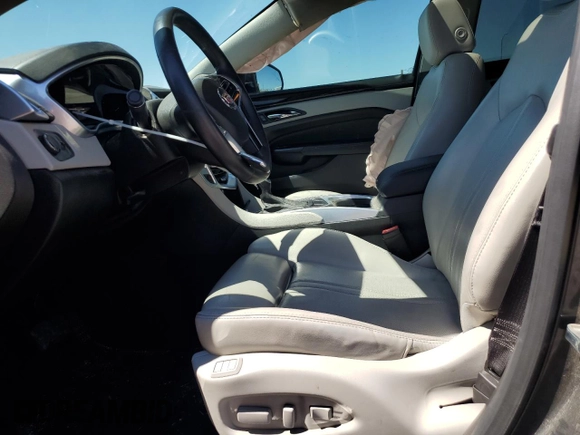 2016 Cadillac SRX Luxury Collection with VIN 3GYFNBE37GS556832, listed as a Copart auction lot 71701164 with 118,871 mi miles and Salvage title. Bid and sale history available at DreamBid. Image 7.