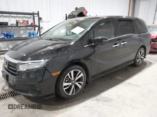 2023 Honda Odyssey Touring z VIN 5FNRL6H85PB039450, wystawiony jako IAAI lot #41504351 z przebiegiem 51 000 mil mil oraz . Historia ofert i sprzedaży dostępna na DreamBid. Obrazek 17.