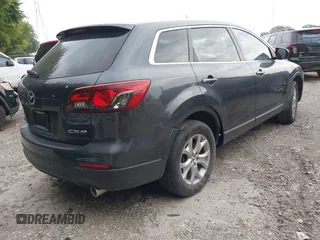 2015 Mazda CX-9 Touring with VIN JM3TB2CA5F0452775, listed as a IAAI auction lot 42659258 with 129,948 mi miles and . Bid and sale history available at DreamBid. Image 4.