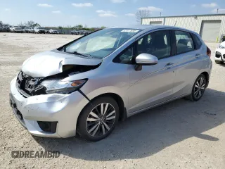 2015 Honda Fit EX z VIN 3HGGK5G89FM744818, wystawiony jako Copart lot #52977685 z przebiegiem 99 719 mil mil oraz Czysty tytuł • Clean title. Historia ofert i sprzedaży dostępna na DreamBid. Obrazek 1.