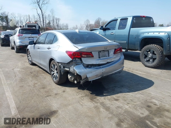 2015 Acura TLX with VIN 19UUB1F31FA017235, listed as a IAAI auction lot 41810472 with 130,762 mi miles. Bid and sale history available at carsss.com. Image 3.