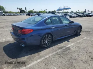2018 BMW 5 Series 540i with VIN WBAJE5C51JWA94673, listed as a Copart auction lot 59807825 with 77,051 mi miles and Salvage title. Bid and sale history available at DreamBid. Image 3.