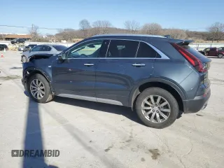 2021 Cadillac XT4 AWD Premium Luxury with VIN 1GYFZDR47MF002175, listed as a Copart auction lot 48303665 with 94,698 mi miles and Salvage Title. Bid and sale history available at carsss.com. Image 2.