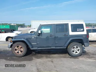 2017 Jeep Wrangler Unlimited Sahara with VIN 1C4HJWEG3HL648158, listed as a IAAI auction lot 42416132 with 95,954 mi miles and . Bid and sale history available at DreamBid. Image 14.