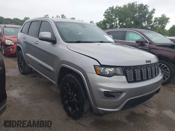 2018 Jeep Grand Cherokee Laredo E with VIN 1C4RJFAG6JC452859, listed as a IAAI auction lot 42647127 with 107,869 mi miles and . Bid and sale history available at DreamBid. Image 1.