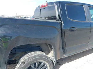 2021 GMC Canyon 2WD Elevation with VIN 1GTG5CEN8M1210433, listed as a IAAI auction lot 41787940 with 77,581 mi miles. Bid and sale history available at carsss.com. Image 17.