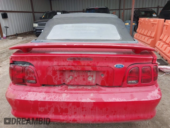 1998 Ford Mustang with VIN 1FAFP4443WF256137, listed as a IAAI auction lot 41542677 with 175,919 mi miles. Bid and sale history available at carsss.com. Image 16.