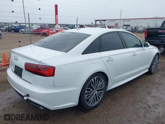 2018 Audi A6 Premium Plus z VIN WAUD8AFC7JN086796, wystawiony jako IAAI lot #42202071 z przebiegiem Nie podano mil oraz . Historia ofert i sprzedaży dostępna na DreamBid. Obrazek 4.