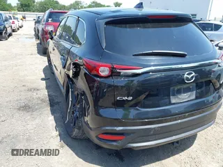 2016 Mazda CX-9 Touring with VIN JM3TCACY7G0101632, listed as a IAAI auction lot 42191115 with 163,070 mi miles and . Bid and sale history available at DreamBid. Image 3.