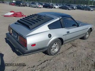 1983 Datsun 280ZX z VIN JN1HZ04S3DX562060, wystawiony jako IAAI lot #42063701 z przebiegiem 35 754 mil mil oraz . Historia ofert i sprzedaży dostępna na DreamBid. Obrazek 4.