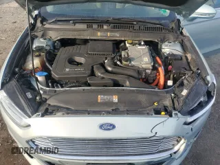 2013 Ford Fusion SE Hybrid z VIN 3FA6P0LU7DR368711, wystawiony jako Copart lot #62367685 z przebiegiem 155 284 mil mil oraz Czysty tytuł • Clean title. Historia ofert i sprzedaży dostępna na DreamBid. Obrazek 11.