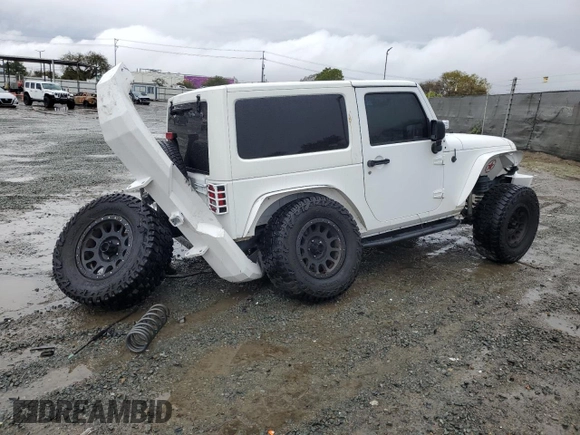 2013 Jeep Wrangler Sahara z VIN 1C4AJWBG7DL512437, wystawiony jako Copart lot #48928325 z przebiegiem Nie podano mil oraz Szkoda całkowita • Salvage title. Historia ofert i sprzedaży dostępna na DreamBid. Obrazek 3.