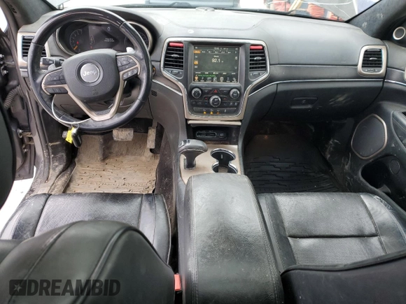 2014 Jeep Grand Cherokee Summit с VIN 1C4RJFJG4EC427075, выставлен на аукционе Copart как лот 49504095 с пробегом 147 342 миль миль и Списание • Salvage title. История ставок и продаж доступна на DreamBid. Изображение 8.
