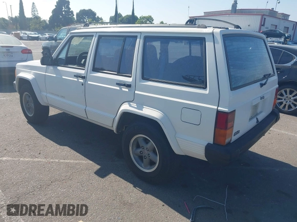 1996 Jeep Cherokee Sport with VIN 1J4FT68S7TL265733, listed as a IAAI auction lot 42499228 with 230,001 mi miles and . Bid and sale history available at DreamBid. Image 3.