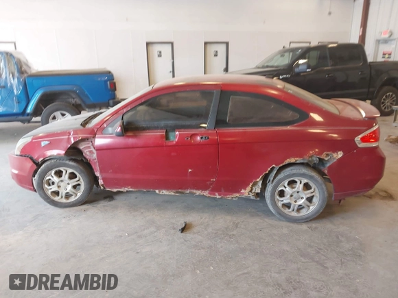 2009 Ford Focus SE with VIN 1FAHP32N49W222419, listed as a IAAI auction lot 42113655 with 238,936 mi miles. Bid and sale history available at carsss.com. Image 6.