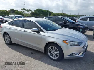 2018 Ford Fusion SE z VIN 3FA6P0LU2JR281231, wystawiony jako IAAI lot #41963083 z przebiegiem 115 434 mil mil oraz . Historia ofert i sprzedaży dostępna na DreamBid. Obrazek 1.