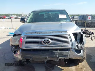 2011 Toyota Tundra with VIN 5TFRM5F18BX033833, listed as a IAAI auction lot 42257200 with 108,046 mi miles and . Bid and sale history available at DreamBid. Image 6.