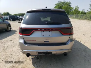2014 Dodge Durango SXT z VIN 1C4RDJAG8EC455892, wystawiony jako Copart lot #57796095 z przebiegiem 98 251 mil mil oraz Szkoda całkowita • Salvage title. Historia ofert i sprzedaży dostępna na DreamBid. Obrazek 6.