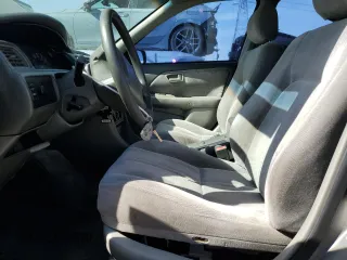 1999 Toyota Camry LE с VIN JT2BG22KXX0284593, выставлен на аукционе Copart как лот 54061685 с пробегом 229 047 миль миль и Списание • Salvage title. История ставок и продаж доступна на DreamBid. Изображение 7.