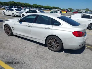 2015 BMW 4 Series 428i with VIN WBA4A5C58FGK15335, listed as a IAAI auction lot 41723243 with 152,652 mi miles and . Bid and sale history available at DreamBid. Image 3.