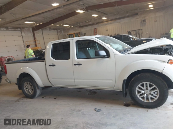 2018 Nissan Frontier SV z VIN 1N6DD0FV7JN718221, wystawiony jako IAAI lot #42118492 z przebiegiem 132 413 mil mil oraz . Historia ofert i sprzedaży dostępna na DreamBid. Obrazek 13.