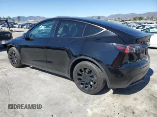 2022 Tesla Model Y Long Range z VIN 7SAYGDEE2NF442073, wystawiony jako Copart lot #49180135 z przebiegiem 34 742 mil mil oraz Szkoda całkowita • Salvage title. Historia ofert i sprzedaży dostępna na DreamBid. Obrazek 2.
