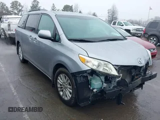 2012 Toyota Sienna XLE AAS with VIN 5TDYK3DC5CS198711, listed as a IAAI auction lot 41530568 with 163,019 mi miles. Bid and sale history available at carsss.com. Image 1.