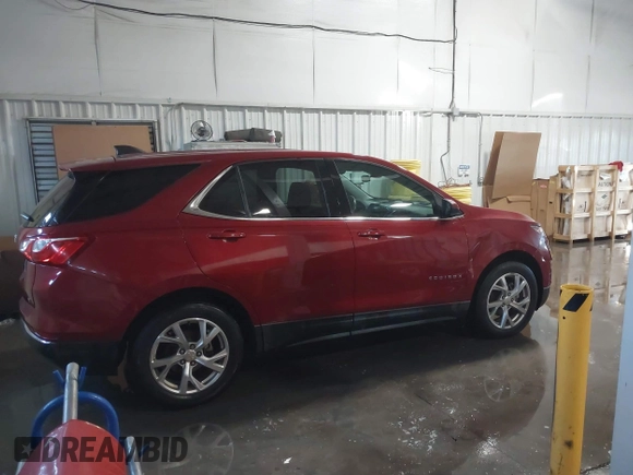 2020 Chevrolet Equinox LT z VIN 2GNAXKEV2L6276893, wystawiony jako IAAI lot #41317709 z przebiegiem 112 437 mil mil oraz . Historia ofert i sprzedaży dostępna na DreamBid. Obrazek 13.