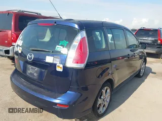 2010 Mazda 5 Sport with VIN JM1CR2W34A0380817, listed as a IAAI auction lot 42047595 with 189,592 mi miles. Bid and sale history available at carsss.com. Image 4.