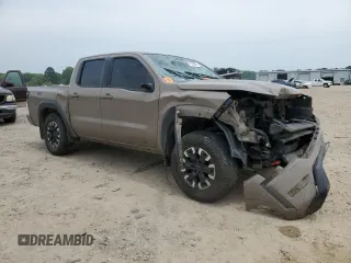 2023 Nissan Frontier Pro-4X with VIN 1N6ED1EK0PN617872, listed as a Copart auction lot 57125435 with 97,981 mi miles and Salvage title. Bid and sale history available at DreamBid. Image 4.