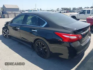 2016 Nissan Altima S z VIN 1N4AL3AP9GC175452, wystawiony jako IAAI lot #41979938 z przebiegiem 145 950 mil mil oraz . Historia ofert i sprzedaży dostępna na DreamBid. Obrazek 14.