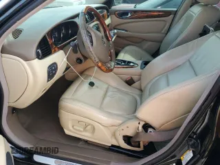 2006 Jaguar XJ with VIN SAJWA71BX6SH01193, listed as a Copart auction lot 76382034 with 0 mi miles and Salvage Title. Bid and sale history available at carsss.com. Image 7.