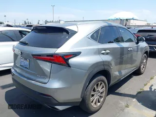 2021 Lexus NX 300 with VIN JTJDARBZ2M2182225, listed as a IAAI auction lot 42500416 with 51,713 mi miles and . Bid and sale history available at DreamBid. Image 4.