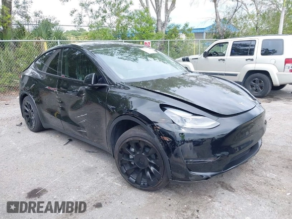 2023 Tesla Model Y Long Range with VIN 7SAYGAEE8PF928923, listed as a IAAI auction lot 41880988 with 18,468 mi miles. Bid and sale history available at carsss.com. Image 1.