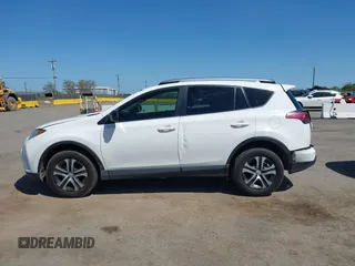 2017 Toyota RAV4 LE with VIN JTMBFREV9HJ147391, listed as a IAAI auction lot 41993617 with 90,666 mi miles. Bid and sale history available at carsss.com. Image 14.