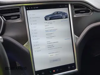 2015 Tesla Model S 85D with VIN 5YJSA1E21FF116775, listed as a IAAI auction lot 41876772 with 128,805 mi miles. Bid and sale history available at carsss.com. Image 19.