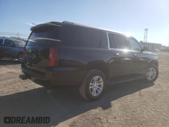 2015 Chevrolet Suburban LT with VIN 1GNSKJKC0FR201554, listed as a Copart auction lot 45614633 with 81,400 mi miles and . Bid and sale history available at DreamBid. Image 3.