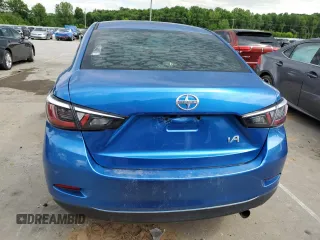 2016 Scion iA z VIN 3MYDLBZVXGY136365, wystawiony jako Copart lot #58978555 z przebiegiem 180 823 mil mil oraz Tytuł czysty. Historia ofert i sprzedaży dostępna na DreamBid. Obrazek 6.